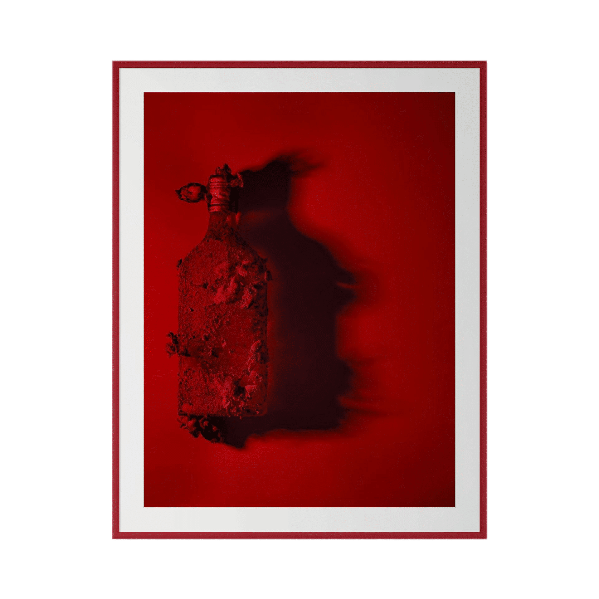 SANGUINE features a glass bottle covered in red paint and debris, casting a shadow on a vivid red background. Framed with a simple red and white border, this Australian photo is perfect for bold interior design wall art. - The Coastal Edit Australia
