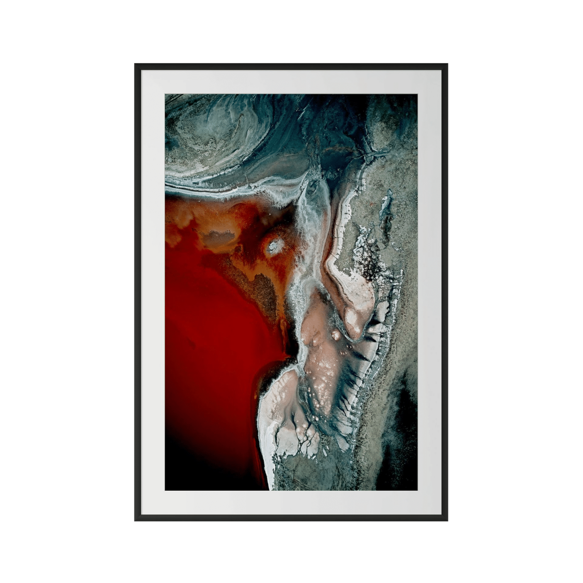 CRIMSON TIDE: Abstract aerial landscape featuring swirling dark green, deep red, tan, and white patterns reminiscent of mineral formations or river deltas. A striking piece of Australian art for luxury coastal décor, framed with a simple black border. - The Coastal Edit Australia